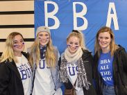 Bachelor of Business Administration (BBA) students cheer on their home team during the annual BUSI-KINE hockey game. Photo courtesy Acadia Business Society.